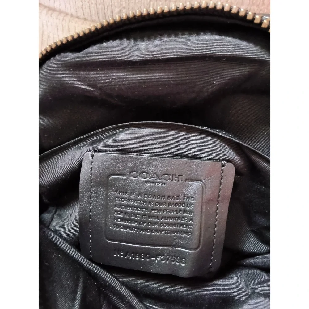 26. Coach Charles Pack Black Leather Sling Crossbody Bag F37598